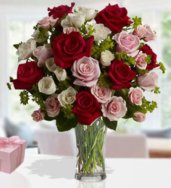 Vase with 10 Stems of Red,10 Stems of Pink & 10 Stems of White Roses in a Glass Vase (one sided round arrangement) Cupids Love