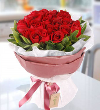Bunch of 50 Red Roses with fillers with nice wrapping paper. Red Enchantment